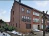 Driegevel woning Gelijkvloers : garage, toilet, studio met berging en keuken 1ste verdieping : leefr